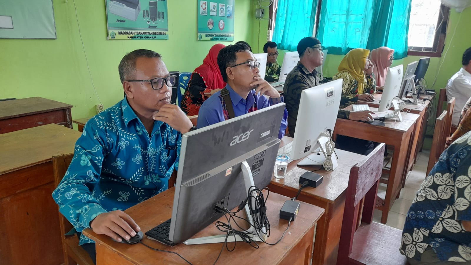 Dua Pegawai MTsN 1 OI Ikuti Ukom Jabatan Pelaksana